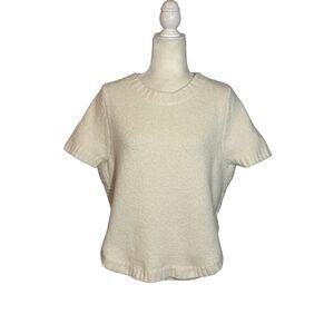 Anthropologie short sleeve cream sweater with pleated back - M